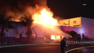 Firefighters respond to a two-alarm fire on Wednesday, June 17, 2020 in Barrio Logan.