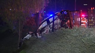 Car crashed through fence