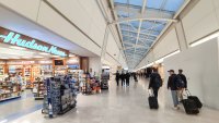 Inside the gate hall area of Terminal 1, waiting rooms, gates, seats, toilets, shops, duty-free, lounges with glass windows, chairs and airplanes at JFK / KJFK John F. Kennedy International Airport in New York City, USA. JFK is one of the biggest airports in the world with 4 runways and 8 terminals, the busiest international air passenger gateway in US. NY, United States of America (Photo by Nicolas Economou/NurPhoto via Getty Images)