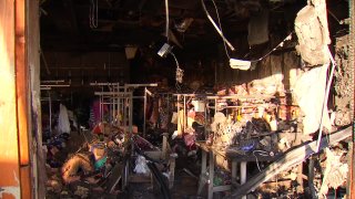 IT shows how the fire completely destroyed a clothing business