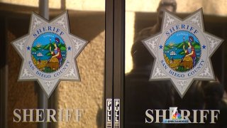 The San Diego County Sheriff's Department logo on doors.