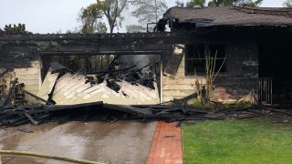 A burned home in El Cajon.