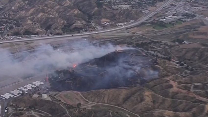 A brush fire burns Monday June 8, 2020 in Castaic.
