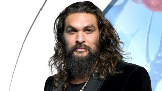 In this Dec. 12, 2018, file photo, Jason Momoa arrives at the premiere of Warner Bros. Pictures' "Aquaman" at the Chinese Theatre in Los Angeles, California.