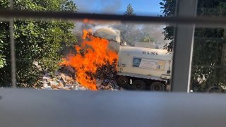 A trash truck made an emergency dump in Mira Mesa on May 5, 2020.