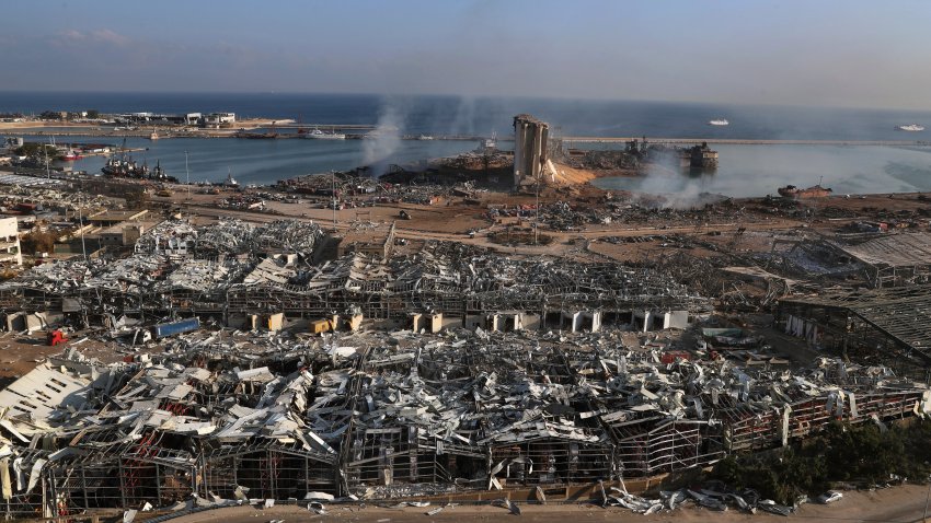 This photo shows a general view of the scene of an explosion that hit the seaport of Beirut, Lebanon, Wednesday, Aug. 5, 2020. A massive explosion rocked Beirut on Tuesday, flattening much of the city's port, damaging buildings across the capital and sending a giant mushroom cloud into the sky.