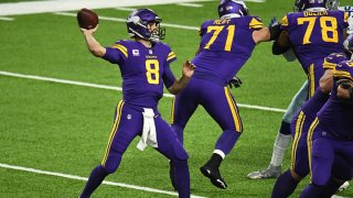 Minnesota Vikings Quarterback Kirk Cousins (8) makes a throw during the 2nd quarter of a National Football League game between the Minnesota Vikings and Dallas Cowboys on November 22, 2020, at US Bank Stadium, Minneapolis, Minnesota.