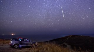 A view of the sky over Russky Island off Vladivostok lit up by the Geminid meteor shower. Yuri Smityuk/TASS