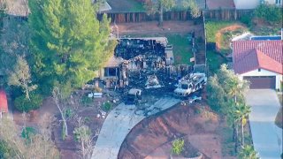 A house fire destroyed a Ramona home early Tuesday, March 2, 2021.