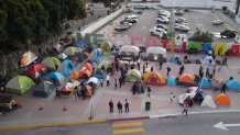 campamento de migrantes en El Chaparral San Diego Tijuana