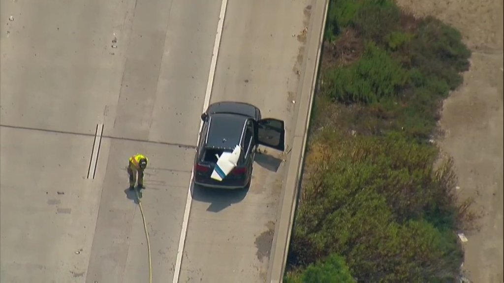 It appears a piece of the aircraft landed on a car on the freeway,