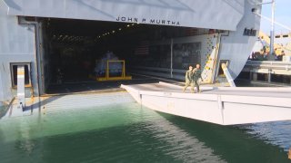 NASA space capsule in the back of a US Navy Ship