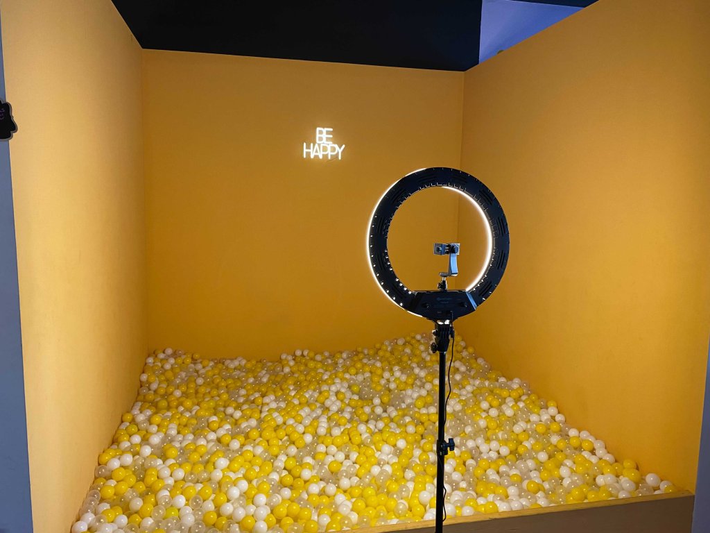 A ball pit at Selfie Social with one simple message -- be happy.