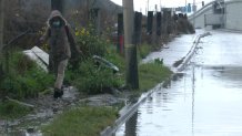 charco de agua en una calle de Tijuana