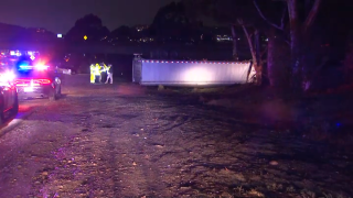 A semi-truck overturned on Interstate 15 near Grantville on Feb. 22, 2022.