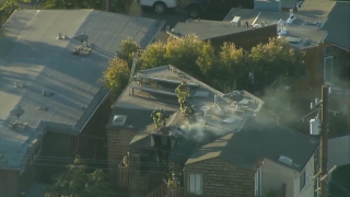 Firefighters respond to a fireplace fire at a condo in Pacific Beach.