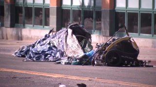 Random items are dumped near the site of a homeless encampment in San Diego on March 14, 2022.