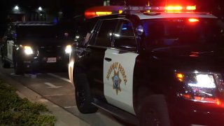 A pair of California Highway Patrol cruisers.