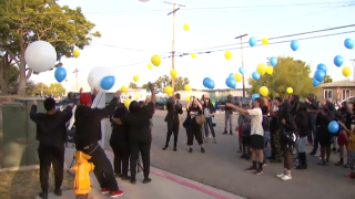 Friends and loved ones release balloons at a May 3 vigil celebrating Trevon Harris, a Lemon Grove middle schooler killed in a traffic accident three years ago.