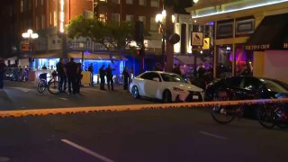 San Diego police say two groups of people were fighting in downtown when someone in the group pulled a gun and fired, hitting two innocent bystanders.