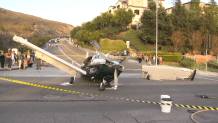 This single-engine plane made an emergency landing at Rancho Santa Fe Road and Melrose Drive in San Marcos and crashed into an SUV at the following intersection, losing a wing in the process.