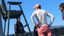 Pickleball SD's Stefan Boyland speaking with police officers July 28 at the Peninsula Tennis Club.