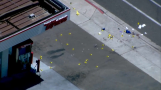 Evidence markers can be seen at the scene of a deadly shooting in La Mesa on Friday, Aug. 12, 2022.