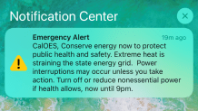 A warning from CalOES is shown on a mobile phone alert, notifying San Diego County residents to conserve energy through 9 p.m., Sept. 6, 2022.