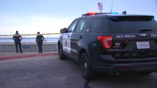 San Diego police respond to a suspicious death on Tuesday, Sept. 13, 2022 after a 65-year-old woman was found suffering from at least one gunshot wound.