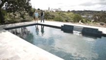 A finished pool in David Giles' backyard