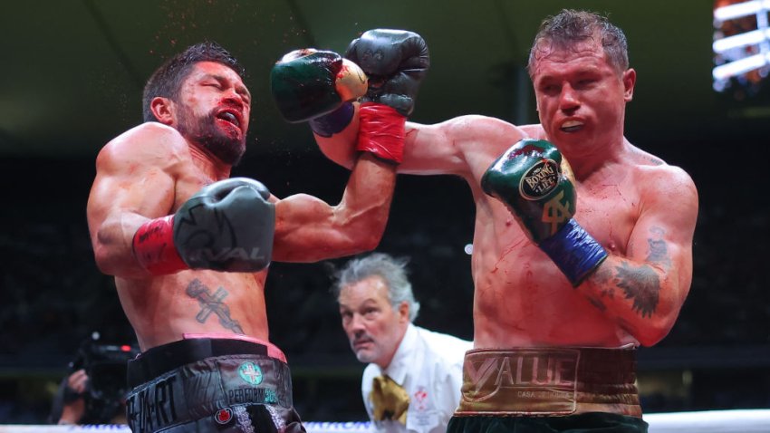 ZAPOPAN, MEXICO – MAY 06: Canelo Alvarez of Mexico punches John Ryder of Great Britain during the fight for the Super Middleweight Championship at Akron Stadium on May 06, 2023 in Zapopan, Mexico. (Photo by Hector Vivas/Getty Images)