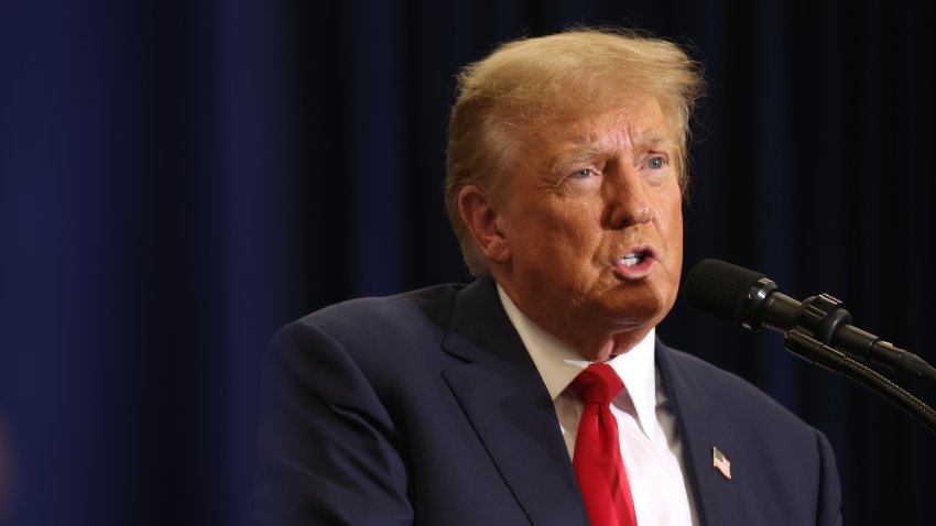 Republican presidential candidate and former U.S. President Donald Trump speaks to guest at a campaign event on December 19, 2023 in Waterloo, Iowa.