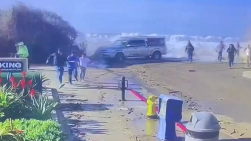 A rogue wave sends people running Thursday Dec. 28, 2023 in Ventura.