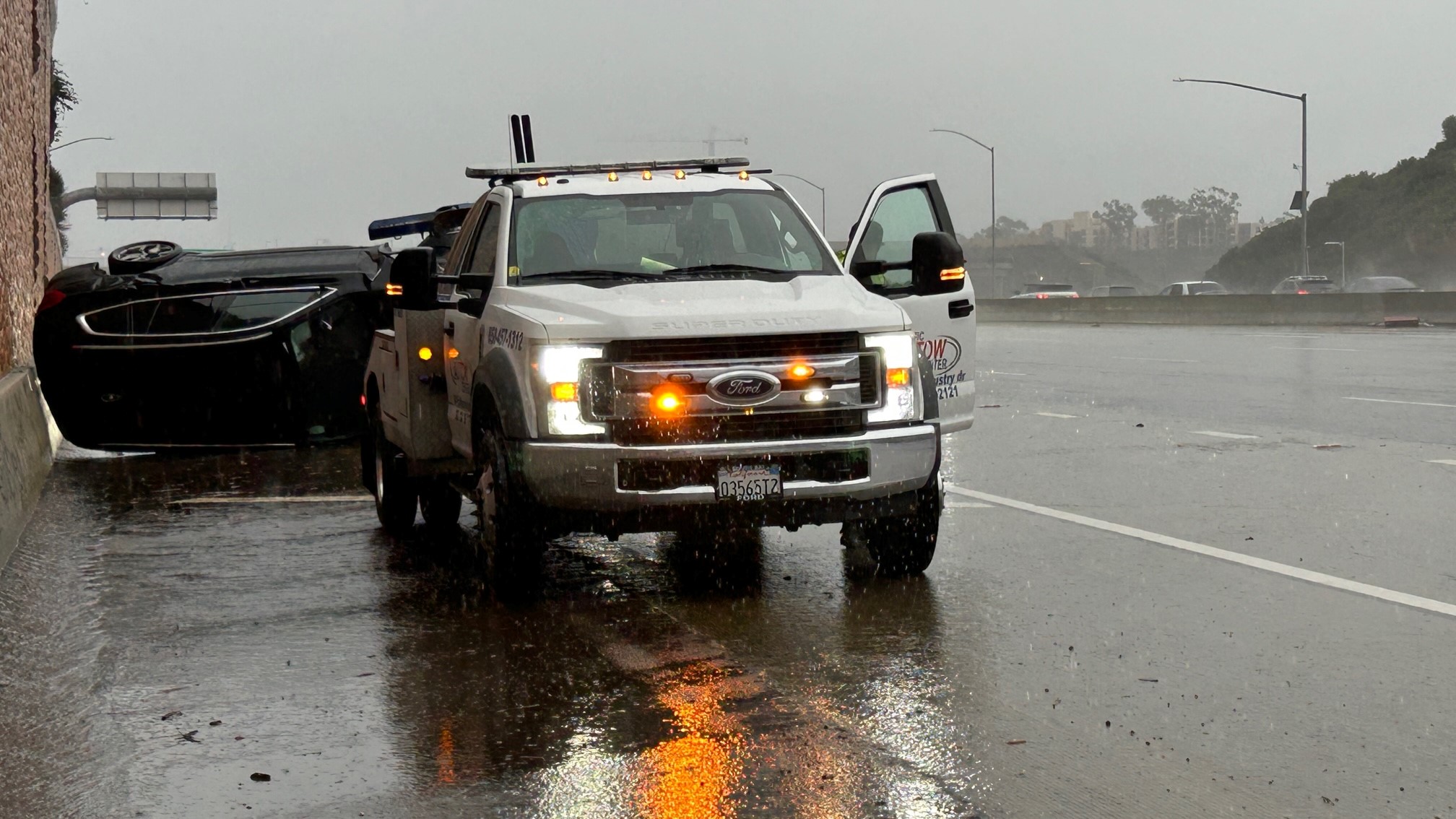 On January 22, 2024 at Genesee Ave.  A vehicle overturned amid heavy rain on I-5 at