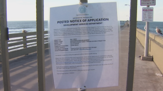 A notice posted on the gate of the Ocean Beach Pier says an application has been filed for the pier's demolition and replacement.