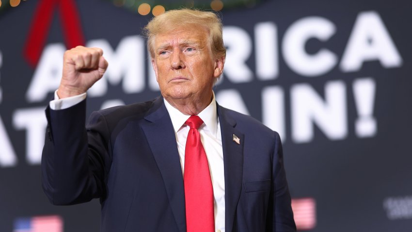 WATERLOO, IOWA – DECEMBER 19: Republican presidential candidate and former U.S. President Donald Trump gestures as he wraps up a campaign event on December 19, 2023 in Waterloo, Iowa. Iowa Republicans will be the first to select their party’s nomination for the 2024 presidential race, when they go to caucus on January 15, 2024. (Photo by Scott Olson/Getty Images)