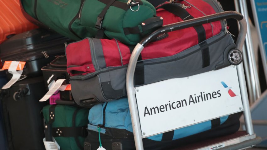 CHICAGO, IL – NOVEMBER 30:  Luggage is prepared for an American Airlines flight at O’Hare International Airport on November 30, 2017 in Chicago, Illinois. American Airlines was offering incentives to entice pilots to fly during the busy Christmas holiday travel period after a computer glitch mistakenly granted too many pilots time off during that time leaving thousands of flights short-staffed.  (Photo by Scott Olson/Getty Images)