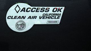 Sticker on an electric vehicle in California allows access to carpool lanes.
