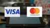 Cómo reclamar parte de un acuerdo millonario con VISA y Mastercard