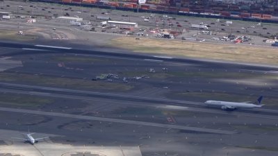 Chopper 4 over Newark Airport where plane went off the runway