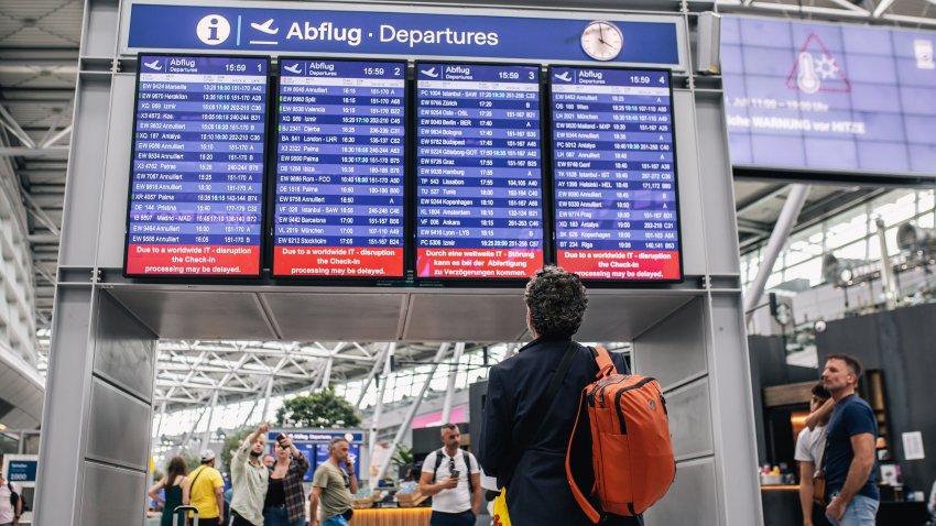 DUSSELDORF, GERMANY – JULY 19: A general view from Dusseldorf Airport as passengers gather and wait due to the global communications outage caused by CrowdStrike, which provides cyber security services to US technology company Microsoft, on July 19, 2024 in Dusseldorf, Germany. (Photo by Hesham Elsherif/Anadolu via Getty Images)