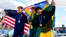 Encinitas' Tom Schaar (L) is taking home the silver in skateboarding park.
Australia's Keegan Palmer (C), who was also born in San Diego, maintains his title. Brazil's Augusto Akio (R) wins the bronze with 91.85.