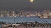 PHOTOS: San Diegans catch a glimpse of a Harvest supermoon eclipse this week