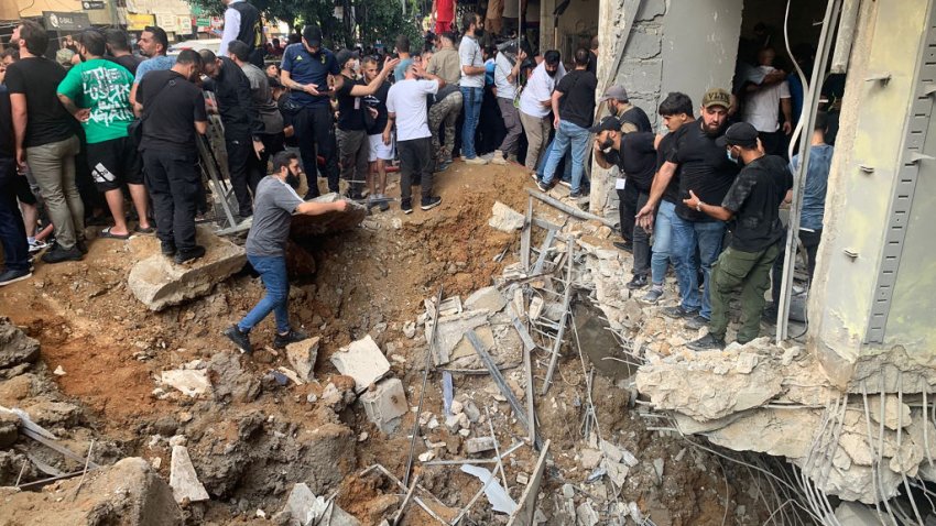 People check the damage following an Israeli strike in Beirut’s southern suburbs on September 20, 2024. A source close to Lebanon’s Hezbollah said the Israeli strike killed the group’s elite Radwan unit chief, while Israel said it had conducted a “targeted strike”. (Photo by AFP) (Photo by -/AFP via Getty Images)