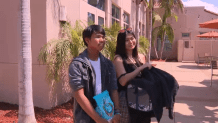 Ashley Tanglao and her brother Jed Deano leave the San Diego Humane Society's campus on Gaines Street with Stryker on Sept. 9, 2024.