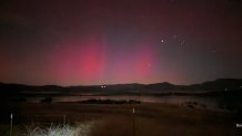 The northern lights as seen from Lake Henshaw, east of Palomar Mountain, on Oct. 11, 2024.