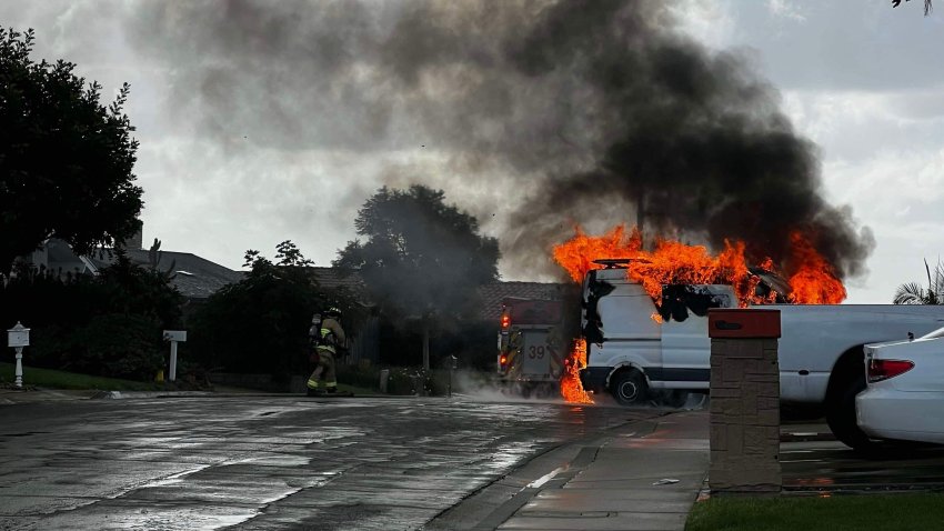 A van on fire in Tierrasanta. A boday was later discovered inside.