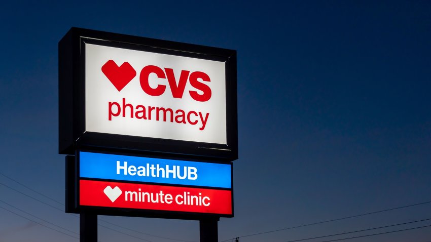 Pearland, Texas, USA – March 3, 2022: A CVS Pharmacy store sign at night is shown in Houston, Texas, USA. CVS Pharmacy  is an American retail corporation.