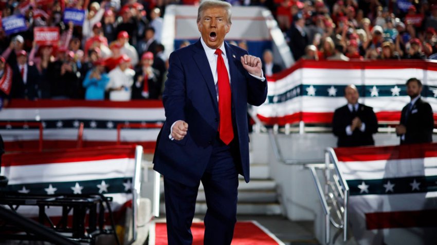 RALEIGH, NORTH CAROLINA – NOVEMBER 04: Republican presidential nominee, former President Donald Trump dances off stage at the conclusion of a campaign rally at the J.S. Dorton Arena on November 04, 2024 in Raleigh, North Carolina. With one day left before the general election, Trump is campaigning for re-election in the battleground states of North Carolina, Pennsylvania and Michigan. (Photo by Chip Somodevilla/Getty Images)