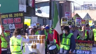 Activistas y migrantes marchan en Tijuana contra las deportaciones masivas